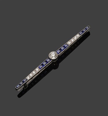 Lot 306 - An Early 20th Century Sapphire and Diamond Bar Brooch, an old brilliant cut diamond centres a...