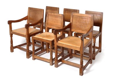 Lot 3594 - Mouseman: A Set of Six (4+2) Robert Thompson of Kilburn English Oak Panel Back Chairs, with...