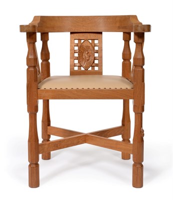 Lot 3598 - Mouseman: A Robert Thompson of Kilburn English Oak Monk's Chair, with curved back and shaped...