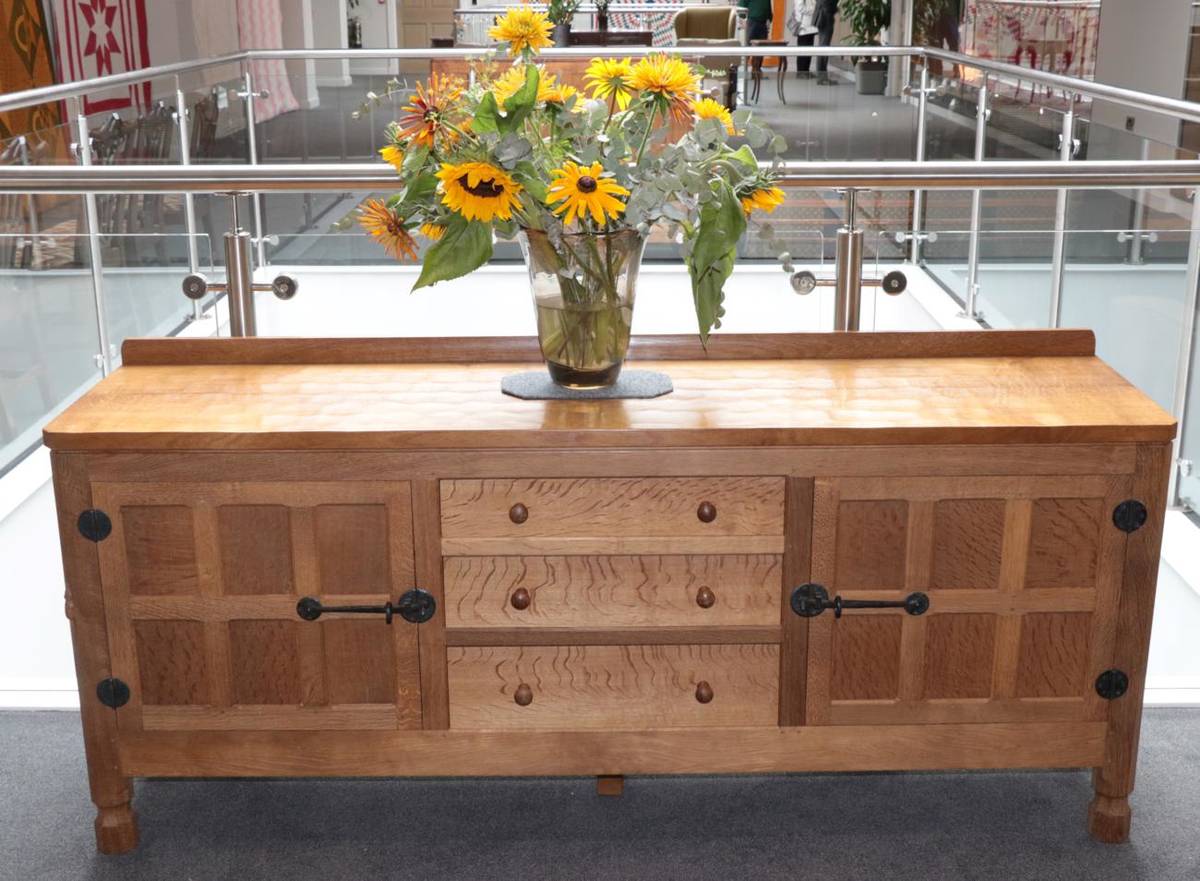 Lot 3601 - Mouseman: A Robert Thompson of Kilburn Panelled English Oak 6ft Sideboard, with raised upstand over