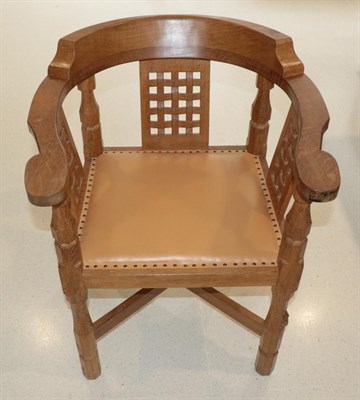 Lot 3616 - Mouseman: A Robert Thompson of Kilburn English Oak Monk's Chair, with curved back and shaped...
