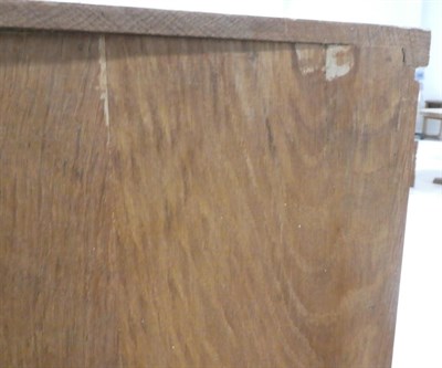 Lot 3623 - Mouseman: A Robert Thompson of Kilburn Glazed English Oak Hanging Corner Cupboard, the leaded...