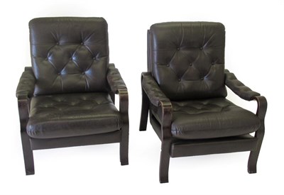 Lot 3659 - A Pair of Danish Design Bentwood and Stained Beechwood Lounge Chairs, upholstered in dark brown...