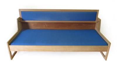 Lot 3685 - Amos Marchant at Blue: An Oak and Steel Reception Desk, 1990's, with a shaped rectangular top...
