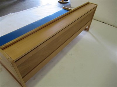 Lot 3685 - Amos Marchant at Blue: An Oak and Steel Reception Desk, 1990's, with a shaped rectangular top...