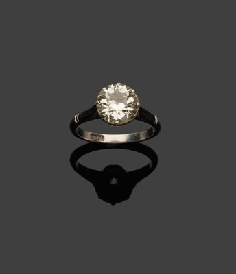 Lot 332 - A Diamond Solitaire Ring, a round brilliant cut diamond in a white eight claw setting to...