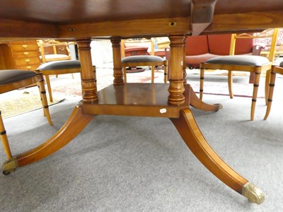 Lot 1006 - A Reproduction Mahogany Satinwood and Burr Wood Crossbanded Circular Dining Table, in the...