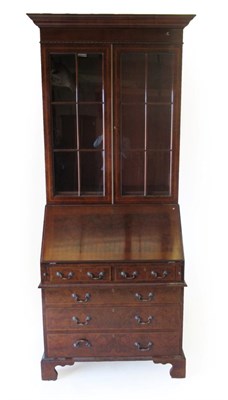 Lot 1009 - A Reproduction Burr Walnut and Feather Banded Bureau Bookcase, modern, the upper section with...