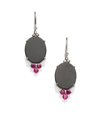 Lot 342 - A Pair of Black Diamond, Onyx and Ruby Drop Earrings, the oval onyx panels with a trefoil of...