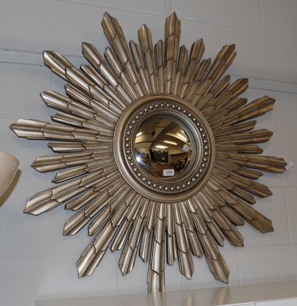 Lot 1046 - A Laura Ashley Constellation Champagne Mirror, modern, 104cm diameter