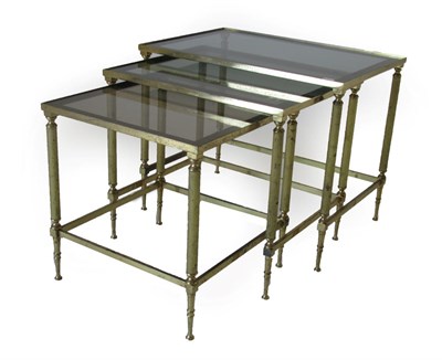 Lot 1050 - A Set of Three Late 20th Century Brass and Glass Top Nesting Tables, of rectangular form with...