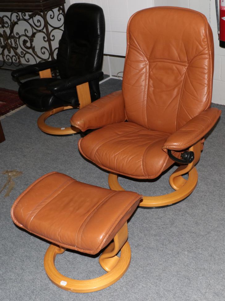 Lot 1068 - An Ekornes Stressless Swivel Lounge Chair, in tan leather, with padded arms and beech frame,...