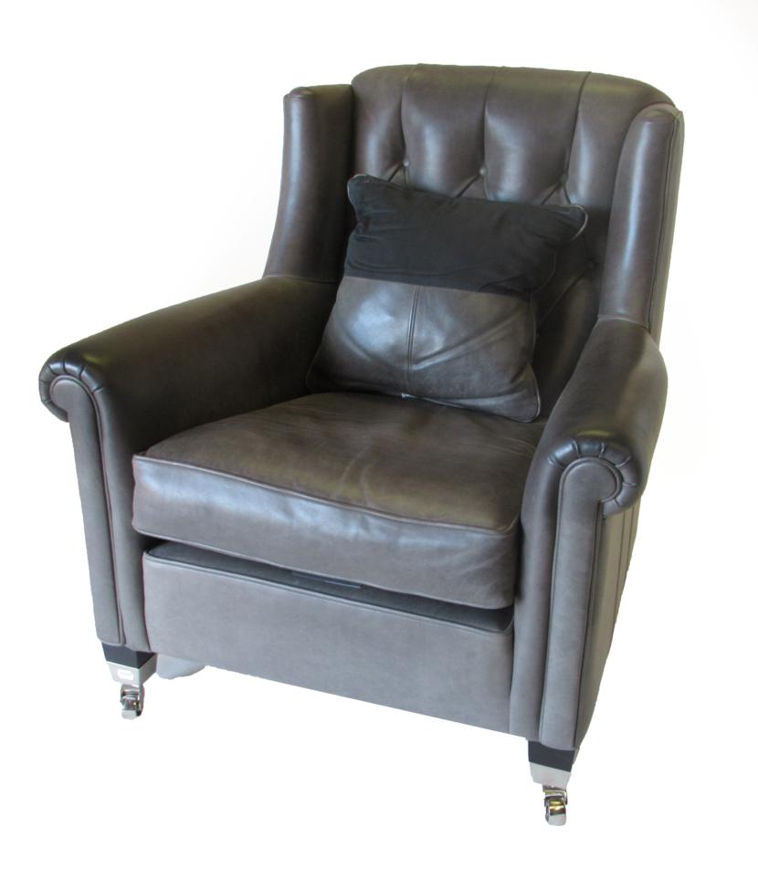 Lot 1071 - Duresta: A Wing-Back Chair, modern, covered in Aston Grey leather, with buttoned back, rounded...