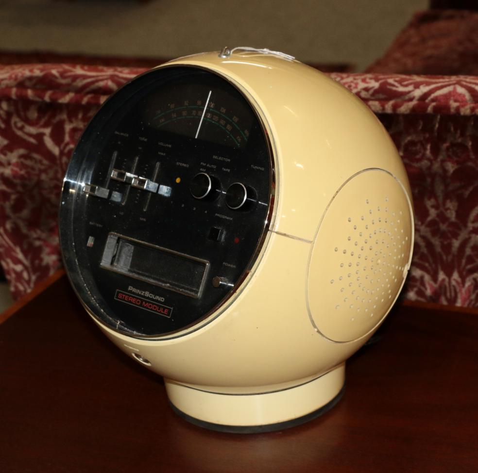 Lot 1079 - A PrinzSound Stereo Module SM8, in the classic 1970's space helmet shape, eight tape slot, with...