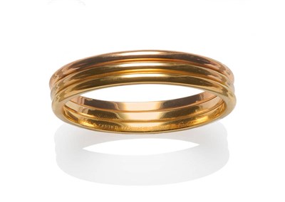 Lot 352 - A Bangle, by Cartier, three coloured parallel bangles, cased