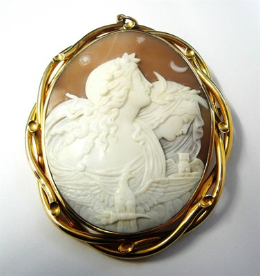 Lot 356 - A Cameo Brooch, the oval shell cameo depicting night and day, within an interlocking tube...