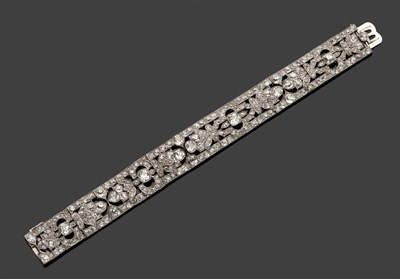 Lot 379 - A Diamond Bracelet, circa 1920, old cut diamonds in white claw and rubbed over settings, in a...