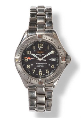 Lot 382 - A Stainless Steel Automatic Calendar Centre Seconds Wristwatch, signed Breitling, Model SuperOcean