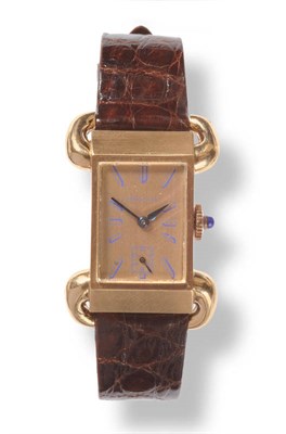 Lot 404 - A Rare 18ct Gold Wristwatch with Unusual Shaped Lugs, signed Tiffany & Co, circa 1940, 17-jewel...