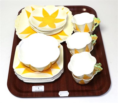 Lot 1 - ^ A Shelley part tea service, pattern number 11993/31, with yellow geometric design,...