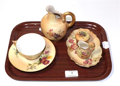 Lot 7 - ^  Royal Worcester blush ivory comprising: small jug, teacup and saucer, pin tray, trinket box...