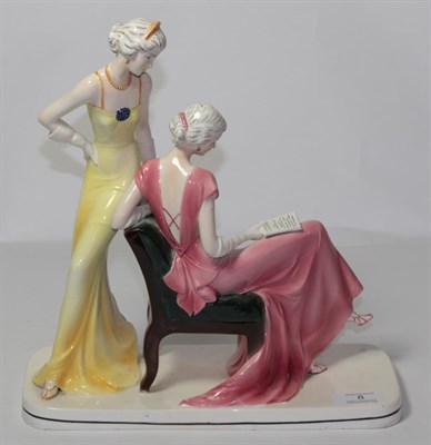 Lot 8 - ^  Katzhutte Art Deco figure group, modelled as two elegant ladies, one seated reading a...
