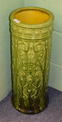 Lot 49 - ^ A Bretby green glazed cylindrical ceramic stick stand, impressed '625 England', 63cm high