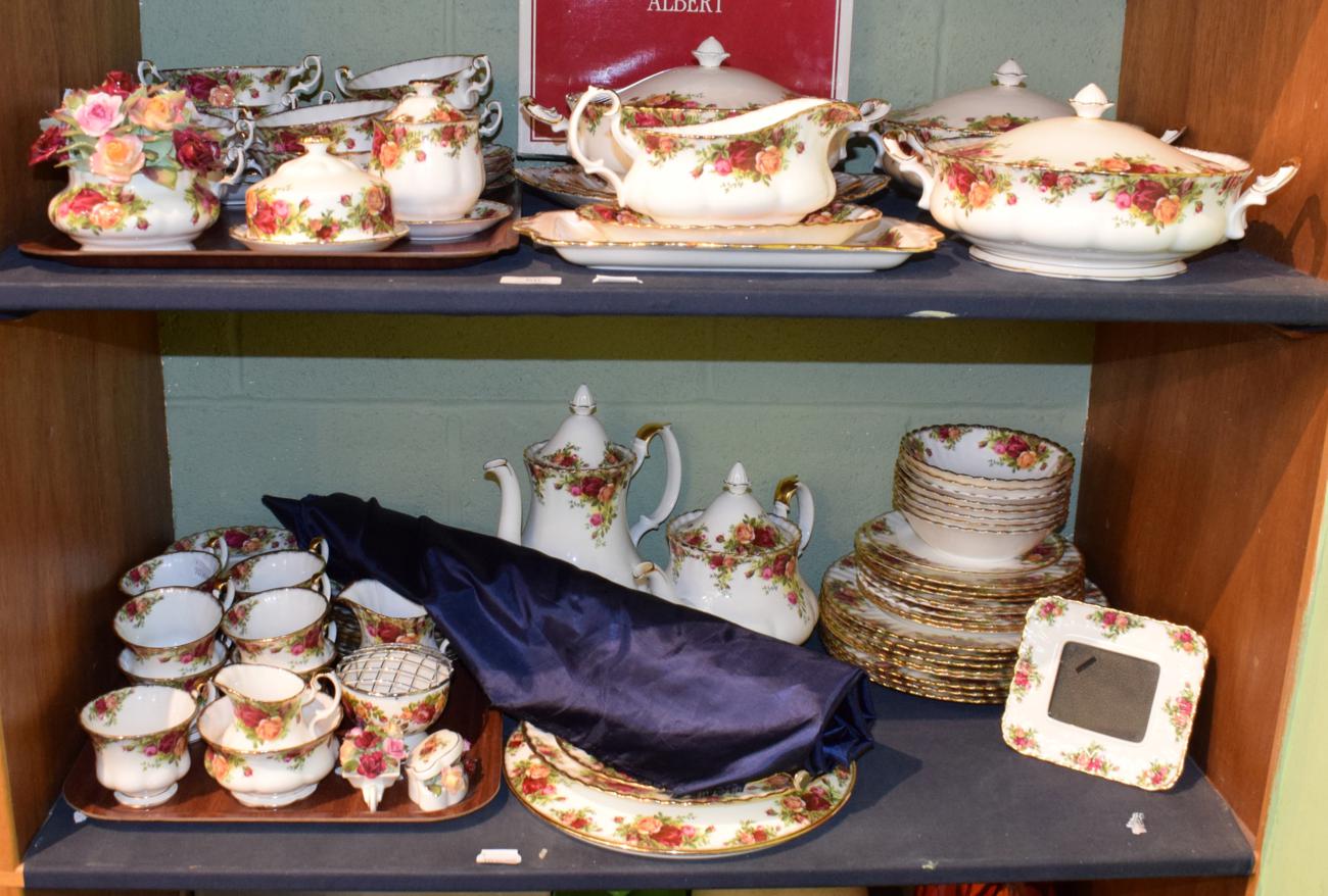 Lot 56 - Royal Albert Old Country Roses dinner and tea wares (two shelves)