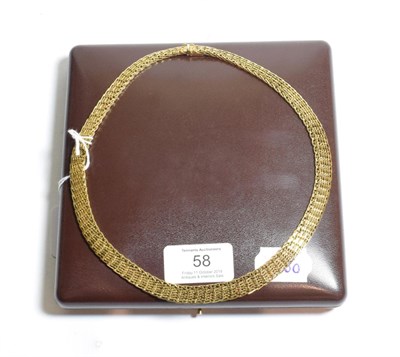 Lot 58 - A fancy link necklace, stamped '750', length 44cm, cased