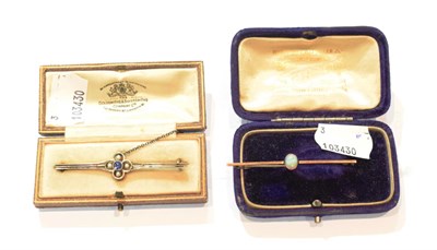 Lot 60 - A sapphire and seed pearl bar brooch, length 5.5cm; and an opal bar brooch, length 5.5cm (2)