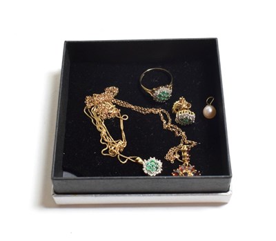 Lot 84 - A 9 carat gold gem set suite including stud earrings, ring, finger size L1/2; and pendant on chain