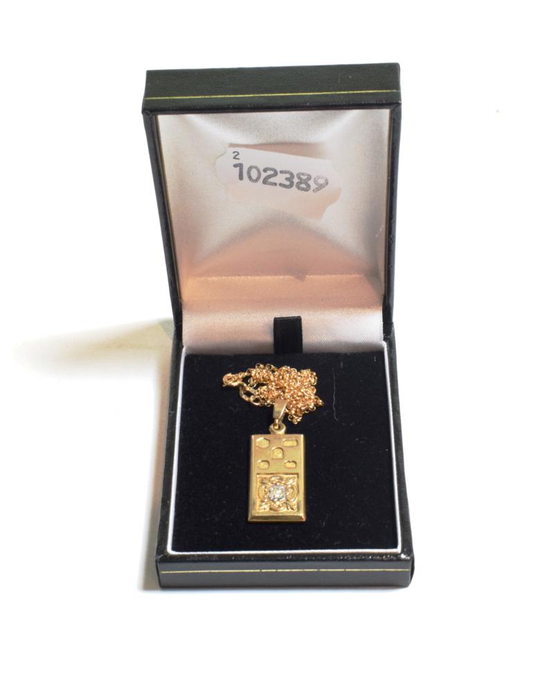Lot 88 - A 9 carat gold diamond set 1/4oz ingot on a 9 carat gold chain, chain length 51cm