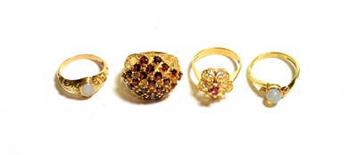 Lot 101 - A 9 carat gold garnet cluster ring, finger size M1/2; a stone set ring, unmarked, finger size...
