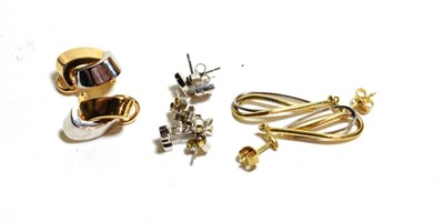 Lot 103 - A pair of 18 carat white gold fish motif stud earrings; three pairs of 9 carat white gold stud...