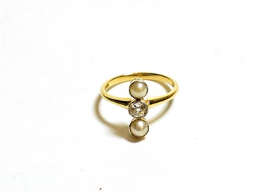 Lot 117 - A pearl and diamond three stone up-the-finger ring, the old cut diamond in a white millegrain...