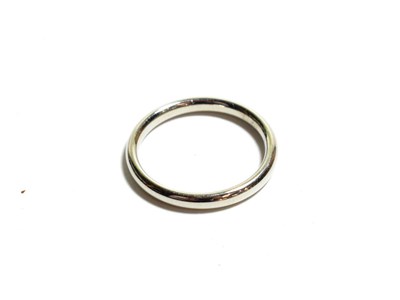 Lot 125 - A platinum band ring, finger size N