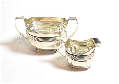 Lot 150 - A George III silver cream-jug and sugar-bowl, the cream-jug by Duncan Urquhart and Naphtali...