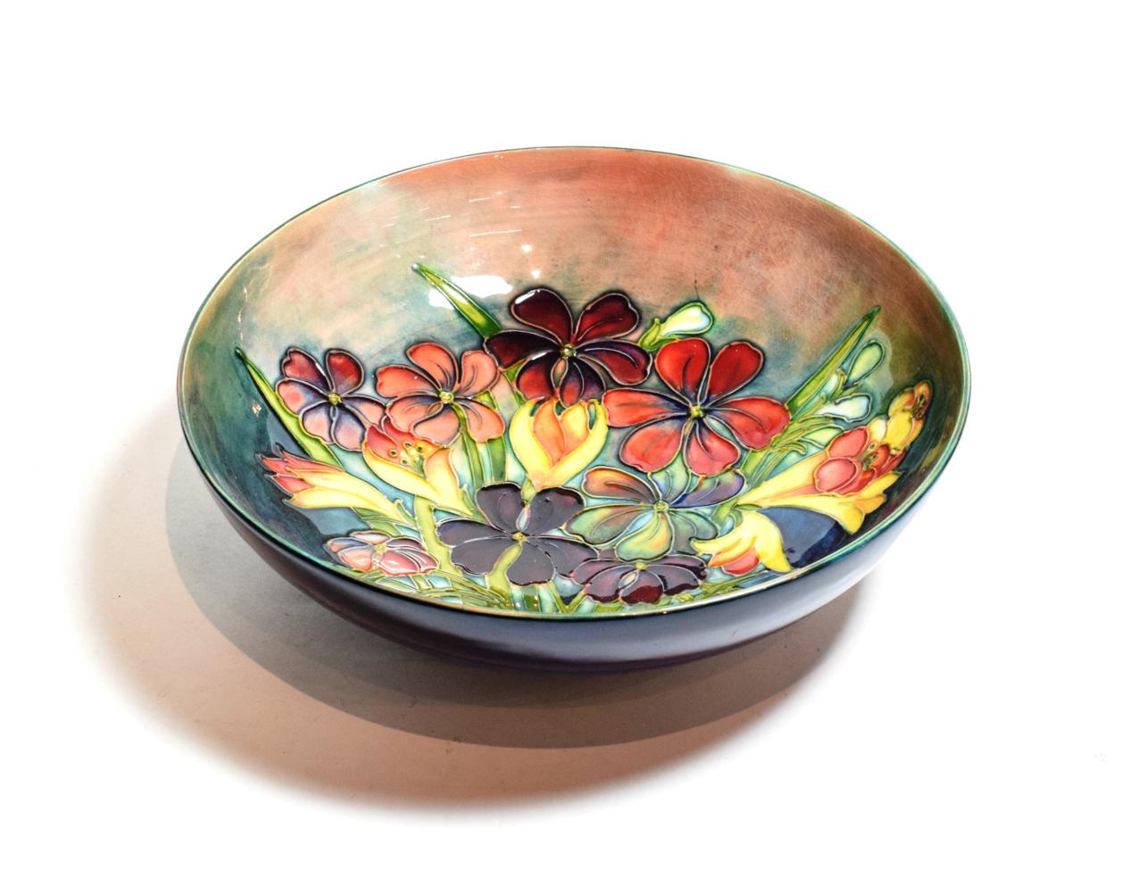 Lot 154 - Moorcroft pottery shallow circular bowl, spring flowers pattern