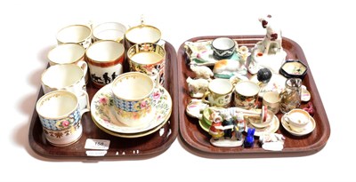 Lot 158 - ^ Derby coffee cans, two saucers and a group of miniature mugs, cups and saucers including...