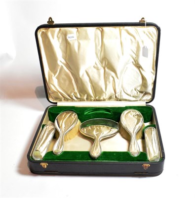 Lot 160 - A Walker & Hall silver backed five-piece dressing table set, cased