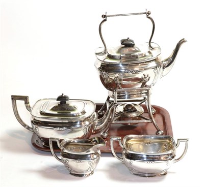 Lot 168 - A four-piece Edward VII Silver Tea-Service, by Horace Woodward and Co. Ltd., London, 1904 and 1905