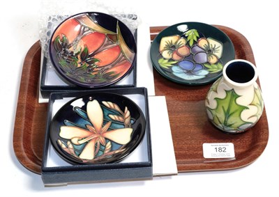Lot 182 - Three modern Moorcroft coasters dated 2004/5/6, together with a small Moorcroft vase