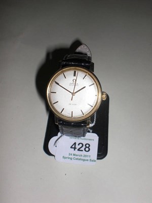 Lot 428 - A 9ct Gold Automatic Calendar Centre Seconds Wristwatch, signed Omega, Model: De Ville, circa 1965