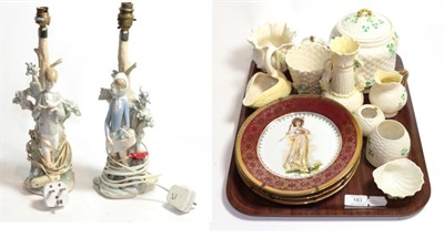 Lot 183 - A collection of Beleek objects and two Lladro lamp bases