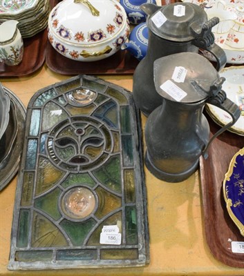 Lot 186 - Assorted 18th century and later British pewter, together with two leaded window panels  (qty)