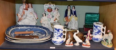 Lot 192 - A quantity of decorative ceramics and ornamental items including four Staffordshire figures,...