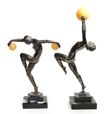 Lot 216 - After Le Verrier & Denis, two Art Deco style patinated figurines modelled as nude female...