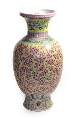 Lot 225 - A modern Chinese vase, four character marks, yellow ground with all-over famille rose...
