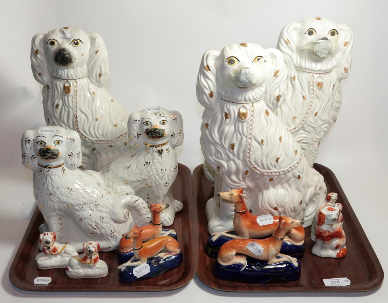 Lot 228 - Thirteen 19th century Staffordshire dogs, various designs and sizes, including pairs (13)