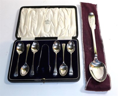 Lot 246 - A collection of teaspoons and sugar tongs and a reproduction spoon